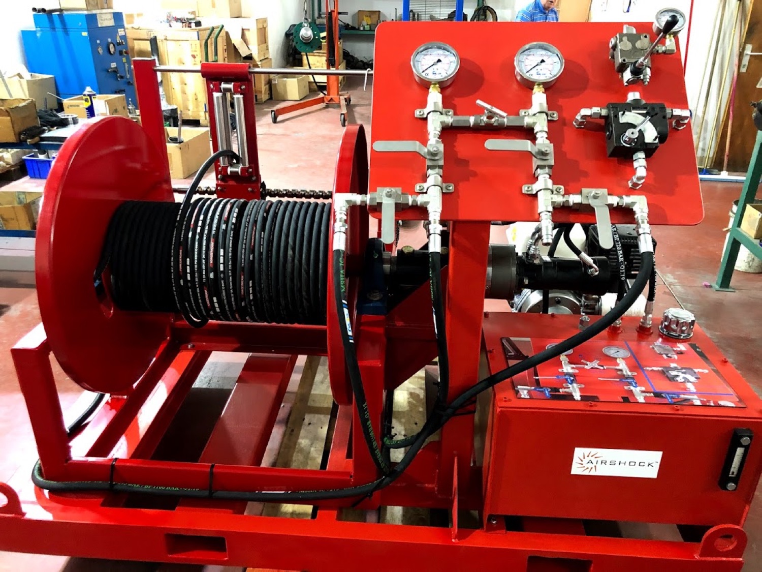 AirShock 600 m hydraulic water well hose reel skid with control panel, gauges and hose spool