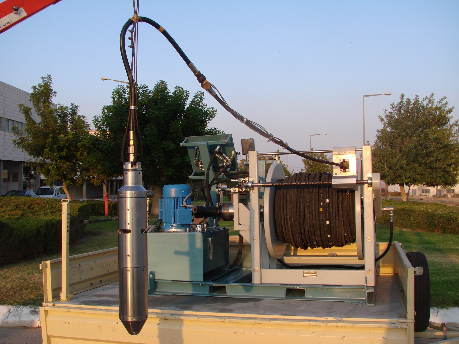 AirShock® impulse generator and hydraulic hose reel, truck-mounted deployment.